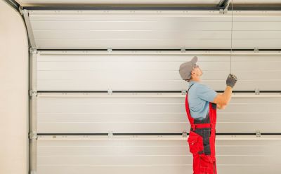 Garage Door Painting in Action